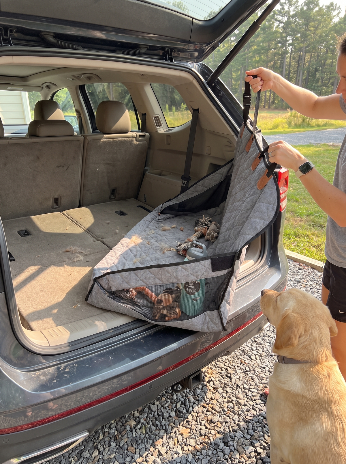 Waterproof travel bed fitted into a car boot
